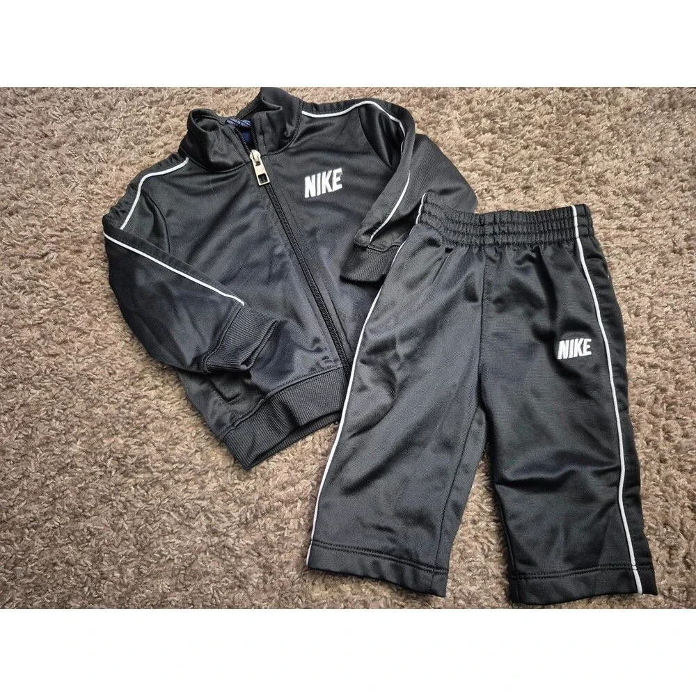 Nike 2 piece track suit size 3-6 months